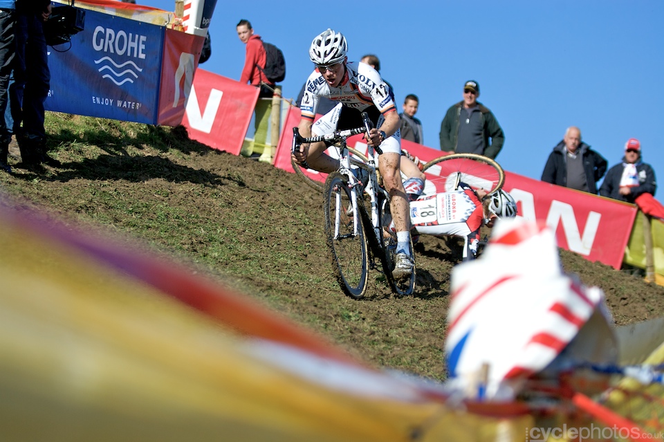 A junior rider crashes during the first round of the Bpost Trofee in Ronse, Belgium. A junior rider crashes during the first round of the Bpost Trofee in Ronse, Belgium.